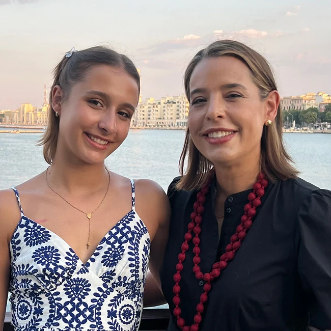 Former patient Alexandra, together with her mother.
